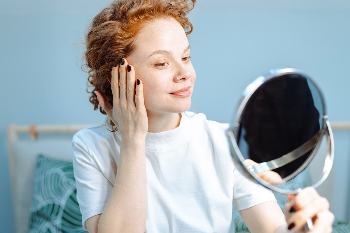 Woman happy with her skin after microneedling in Palo Alto.