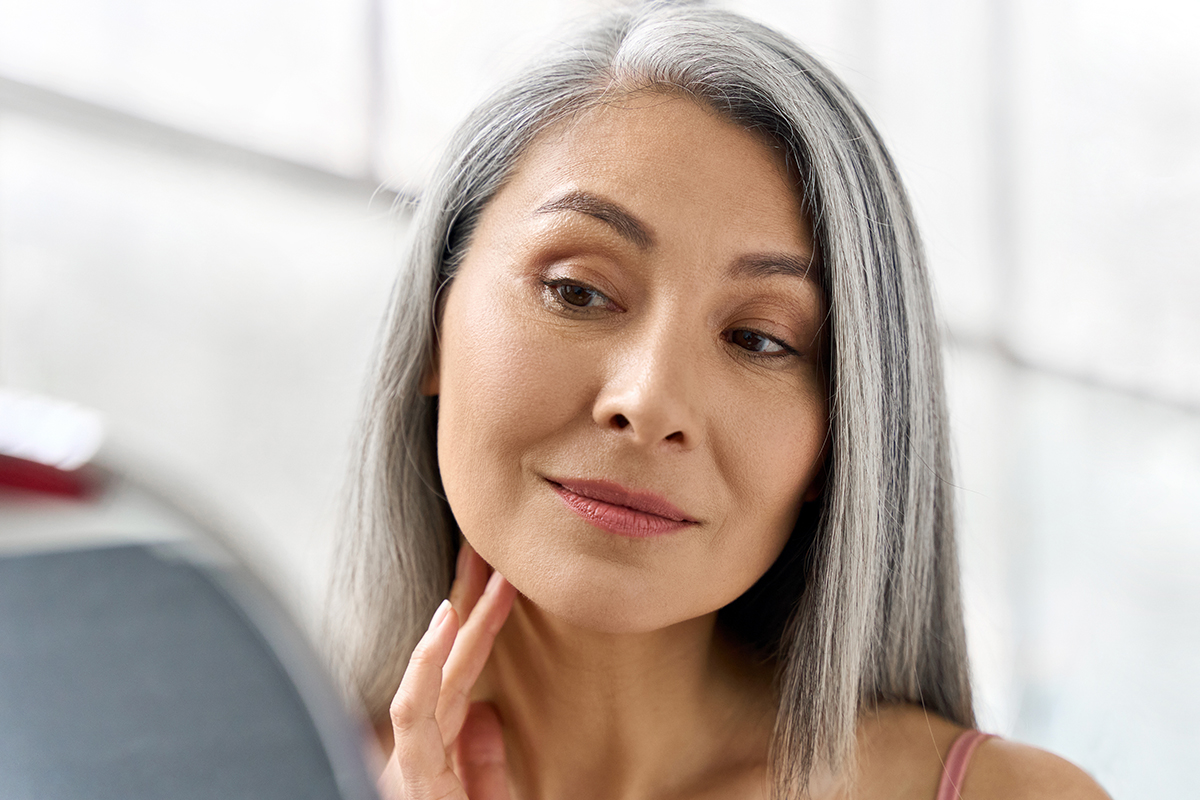 Older woman with a clear complexion after eczema treatment in Palo Alto.