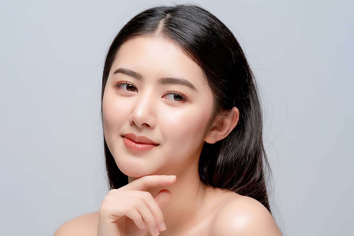 Woman with clear skin after resolving acne in Palo Alto.