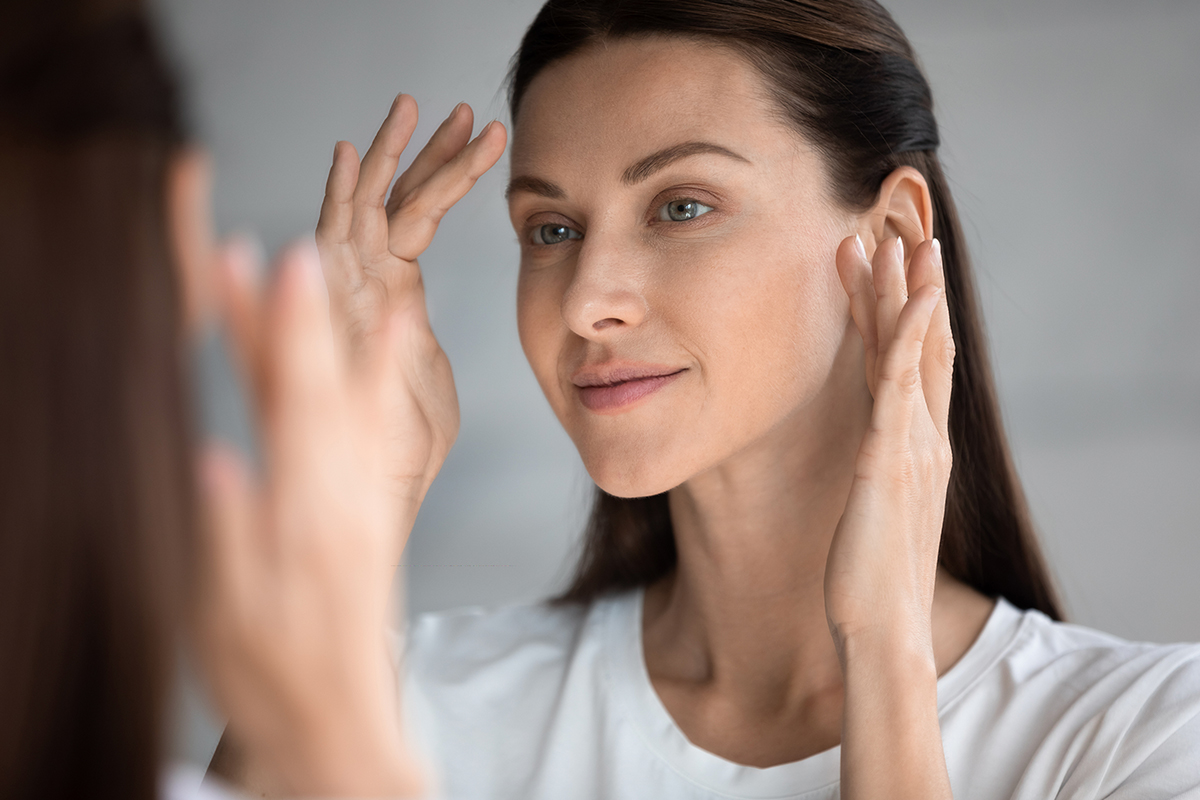 Woman happy with her skin after facials in Palo Alto.